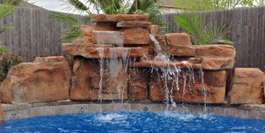 above ground pool with waterfall