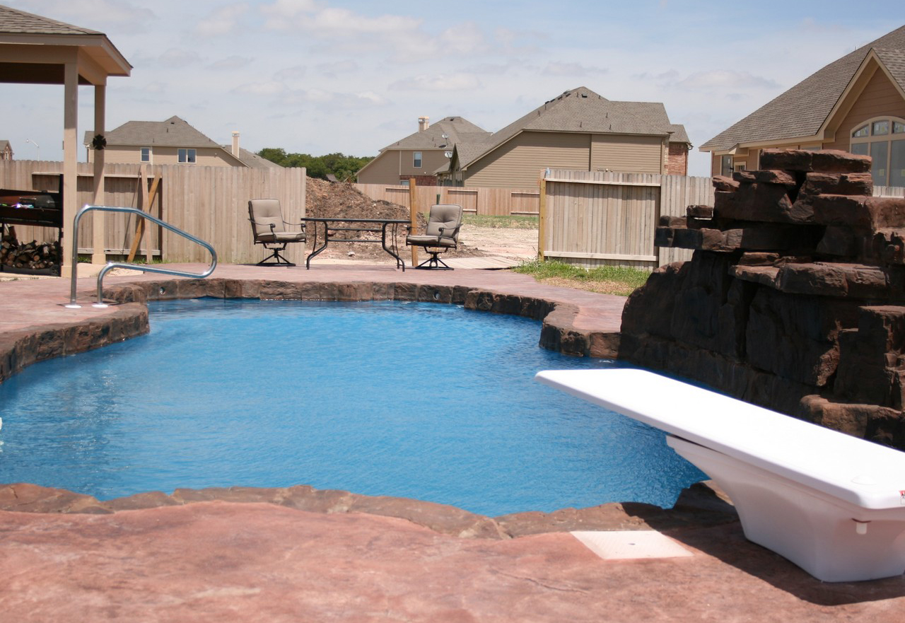 Tulsa Inground Fiberglass Pools Austin Texas private backyard oasis for a non-Airbnb staycation vacation without the hassle of leaving town