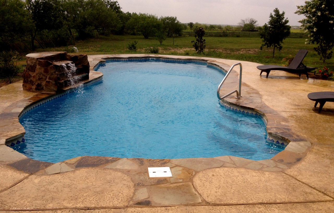 Pleasanton Fiberglass Swimming Pools Tx by Lonestar Pool for a private backyard oasis and staycation without the hassle of packing to leave