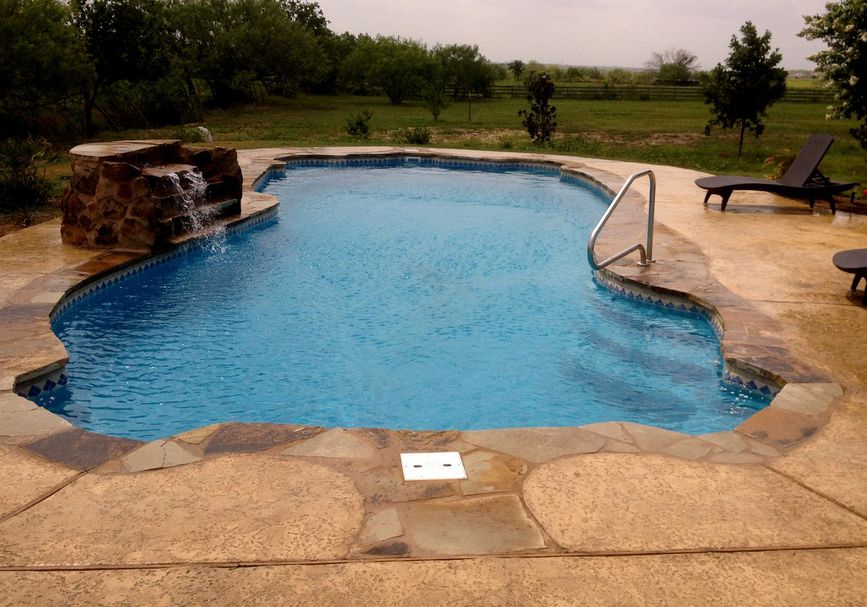 Lonestar Inground Fiberglass Swimming Pools Pipe Creek Texas for a private backyard oasis and staycation without the hassle.