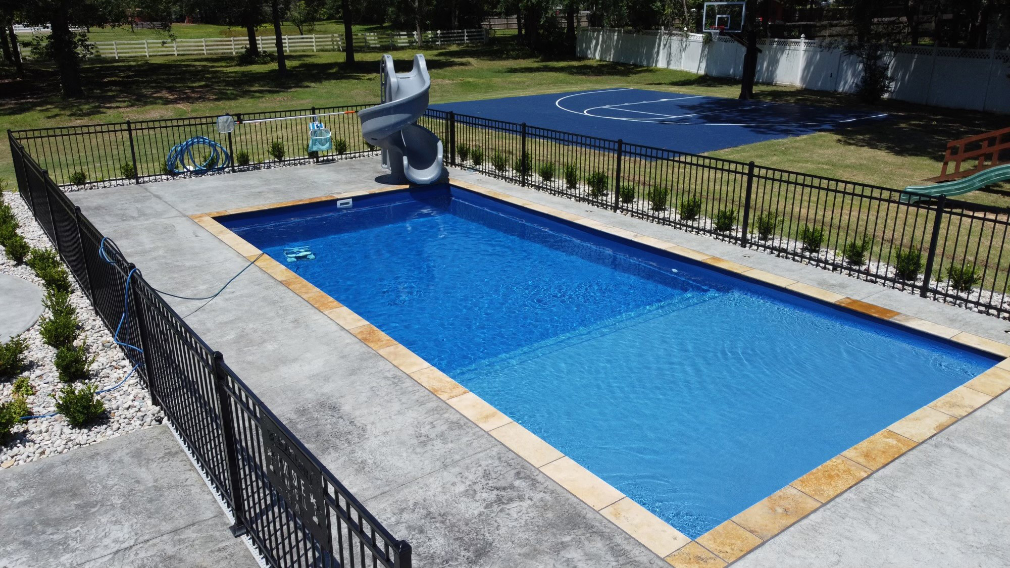 Longview Inground Fiberglass Pools Texas Vegas Style swimming pool is manufactured by Lonestar of New Braunfels for your private backyard oasis 32.515115091507035, -94.71616662663084