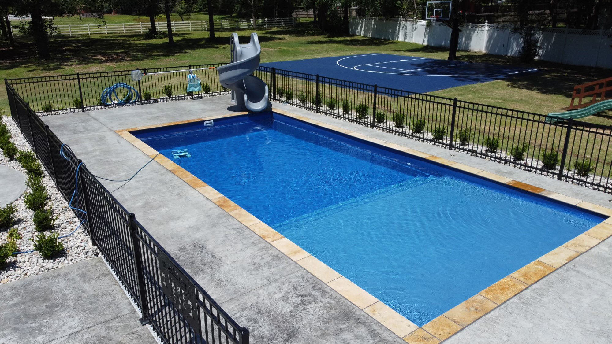 Inground Fiberglass Pool Atascosa Texas by Lonestar Pools for a private backyard oasis and staycation without the hassle of leaving town