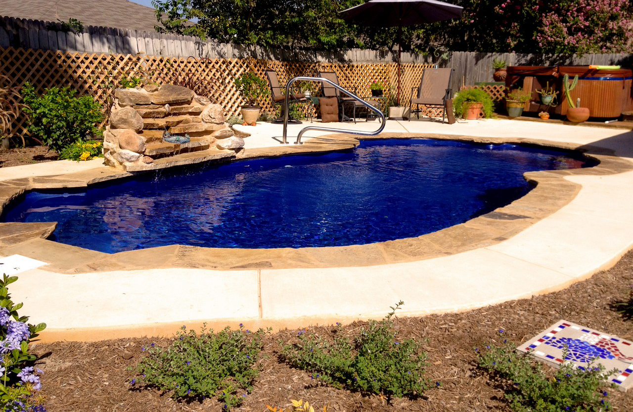 Lonestar Fiberglass Pools Leon Springs Texas for a private backyard oasis and staycation without the hassle of packing to leave home