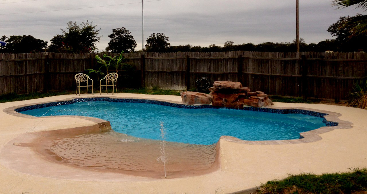 Jourdanton Inground Fiberglass Pools by Lonestar of Texas Manufacturing for a private backyard oasis and staycation without the hassle.