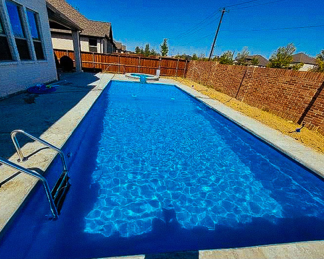 Lonestar Fiberglass Pools Uhland Texas for a private backyard oasis and staycation without the hassle of packing for travel and the airport
