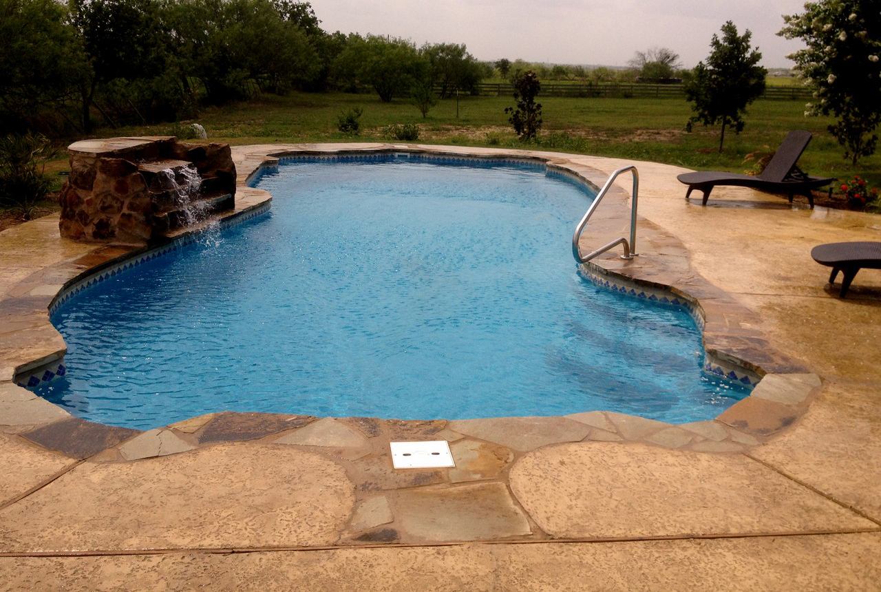 Lonestar Fiberglass Swimming Pools Uvalde Texas private backyard oasis and staycation without the hassle of leaving town for an Airbnb