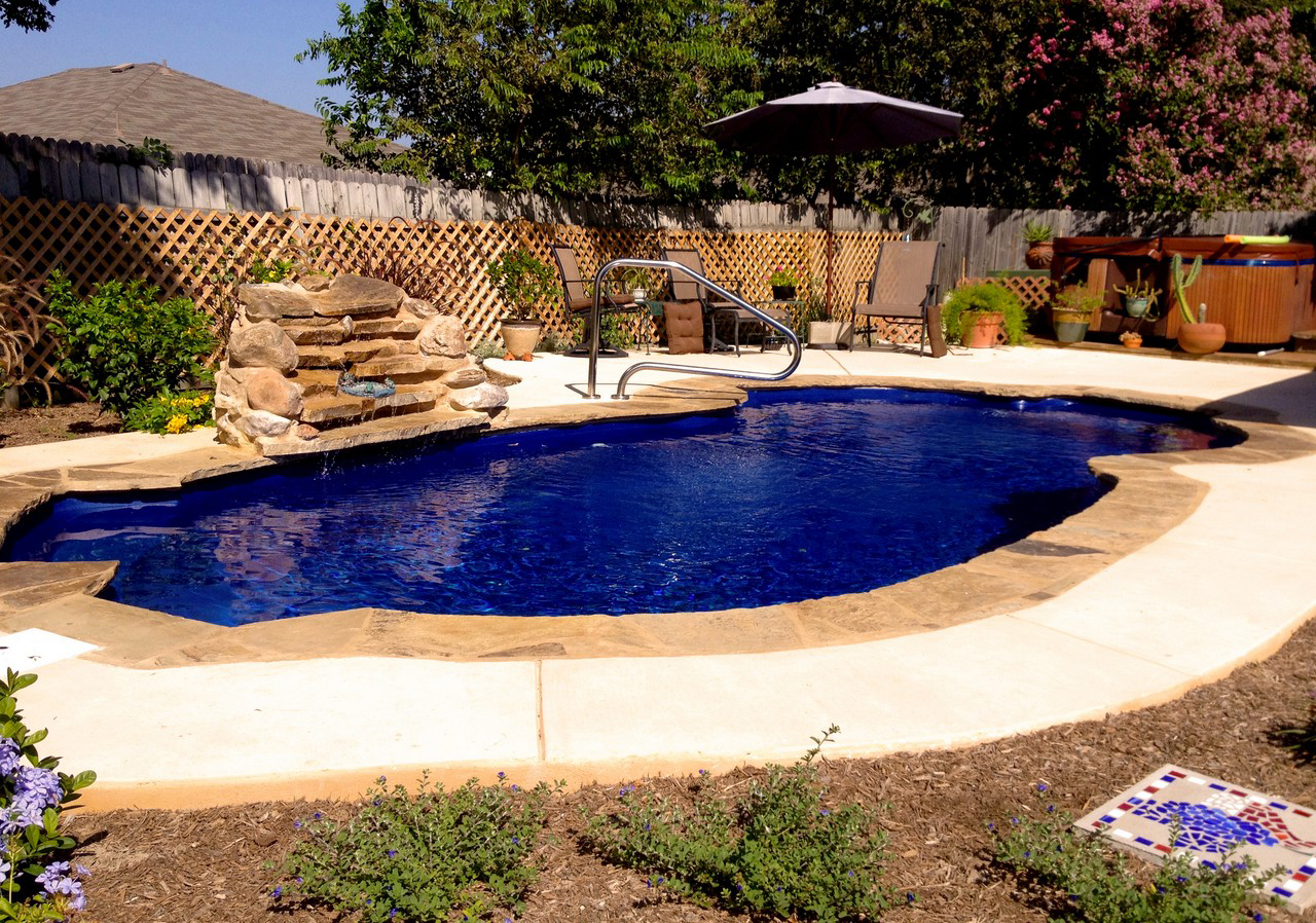 Spring Branch Fiberglass Pools Texas by Lonestar Pool for a private backyard oasis and staycation without the hassle packing for it.