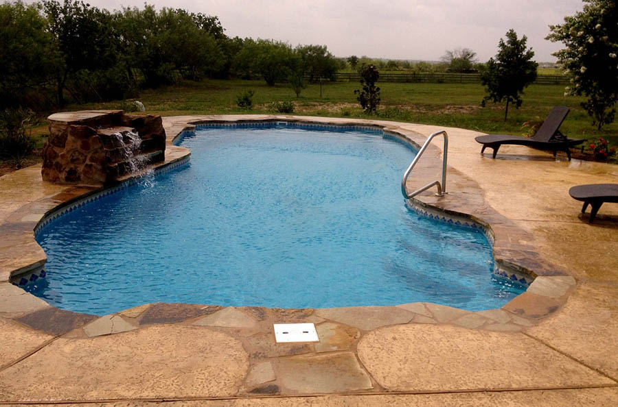 Fiberglass Swimming Pools Addison Texas by Lonestar Pool for a private backyard oasis and staycation without the hassle packing for it.