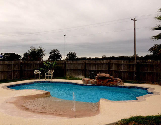 Fiberglass Swimming Pools Carrollton Texas by Lonestar Pool for a private backyard oasis and staycation without the hassle of packing