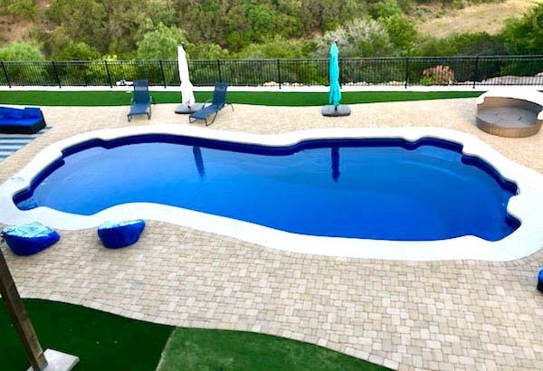 Inground Fiberglass Pools Oklahoma City by Lonestar Pools for a private backyard oasis and staycation without the hassle of leaving town