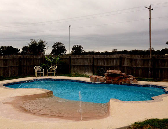 Inground Fiberglass Pools Adkins Texas by Lonestar Pools for a private backyard oasis and staycation without the hassle of leaving town