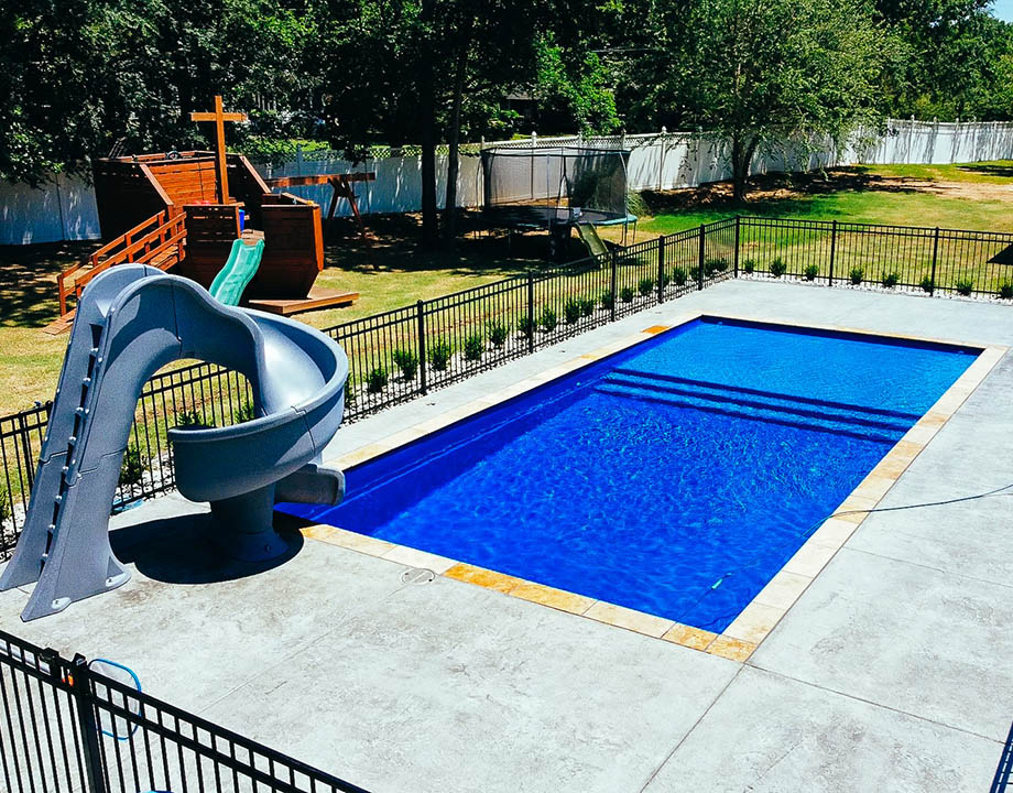 Inground Fiberglass Pools Henderson Point Mississippi Picayune Style Pool that is rated at five stars private backyard oasis