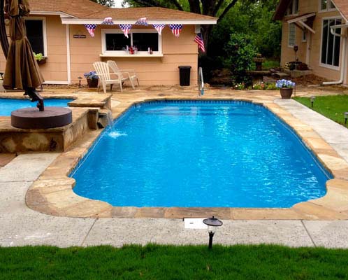 Fiberglass Pools San Atonio Texas Conroe inground swimming pool and a private oasis staycation location right out the back door